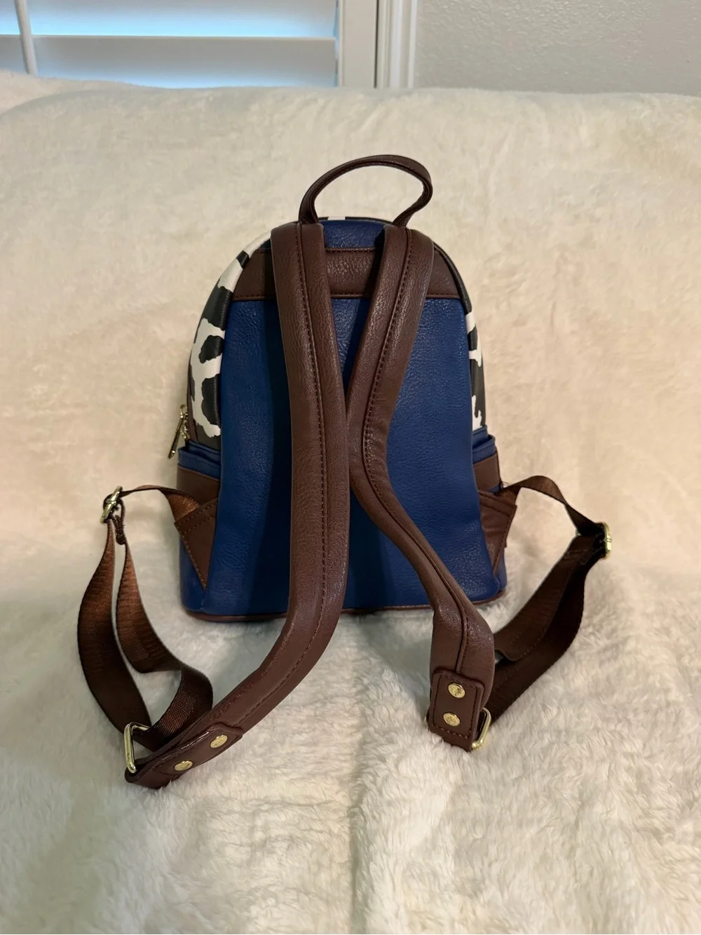 Loungefly Woody-Inspired Mini Backpack in Blue, Brown, Yellow